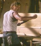 Clay (Viggo Mortensen) working as a carpenter, building coffins.