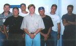 A group of G.I. Jane cast and crew, with Viggo Mortensen on the right.