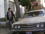 The homeless woman (Exene Cervenka) leads her child (Henry Peter Mortensen) toward the apartment as the husband (Viggo Mortensen) worries that there might be a catch.