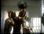 cuffed prisoner's hands