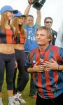 Viggo Mortensen expresses his love for the San Lorenzo team while wearing his soccer jersey to a game.