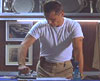 Weps (Viggo Mortensen) irons his shirt